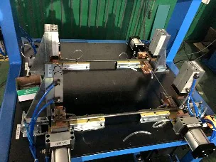 钢网置物架边框四角自动焊机定位机构图